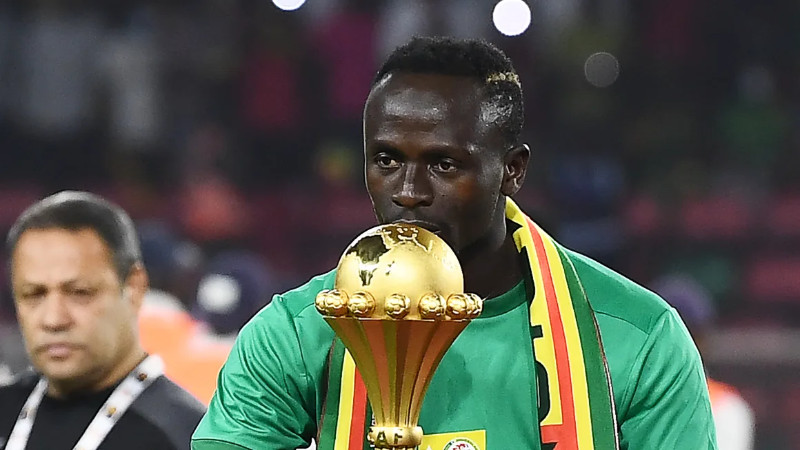 Sadio Mane celebrating after winning the African Cup of Nations final against Egypt.